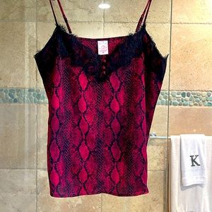 Cutest silky feel bright fuchsia camisole wore once. Black lace around the top